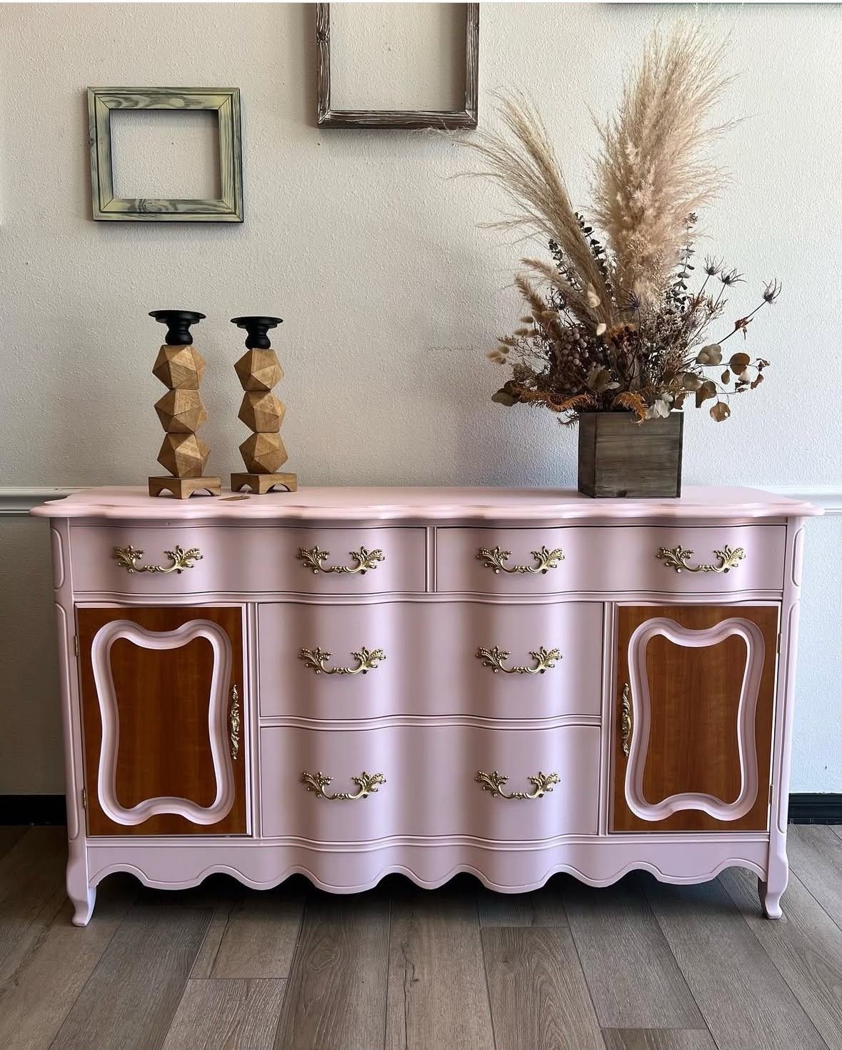 Antique French provincial dresser refinished in soft pink with natural wood panels