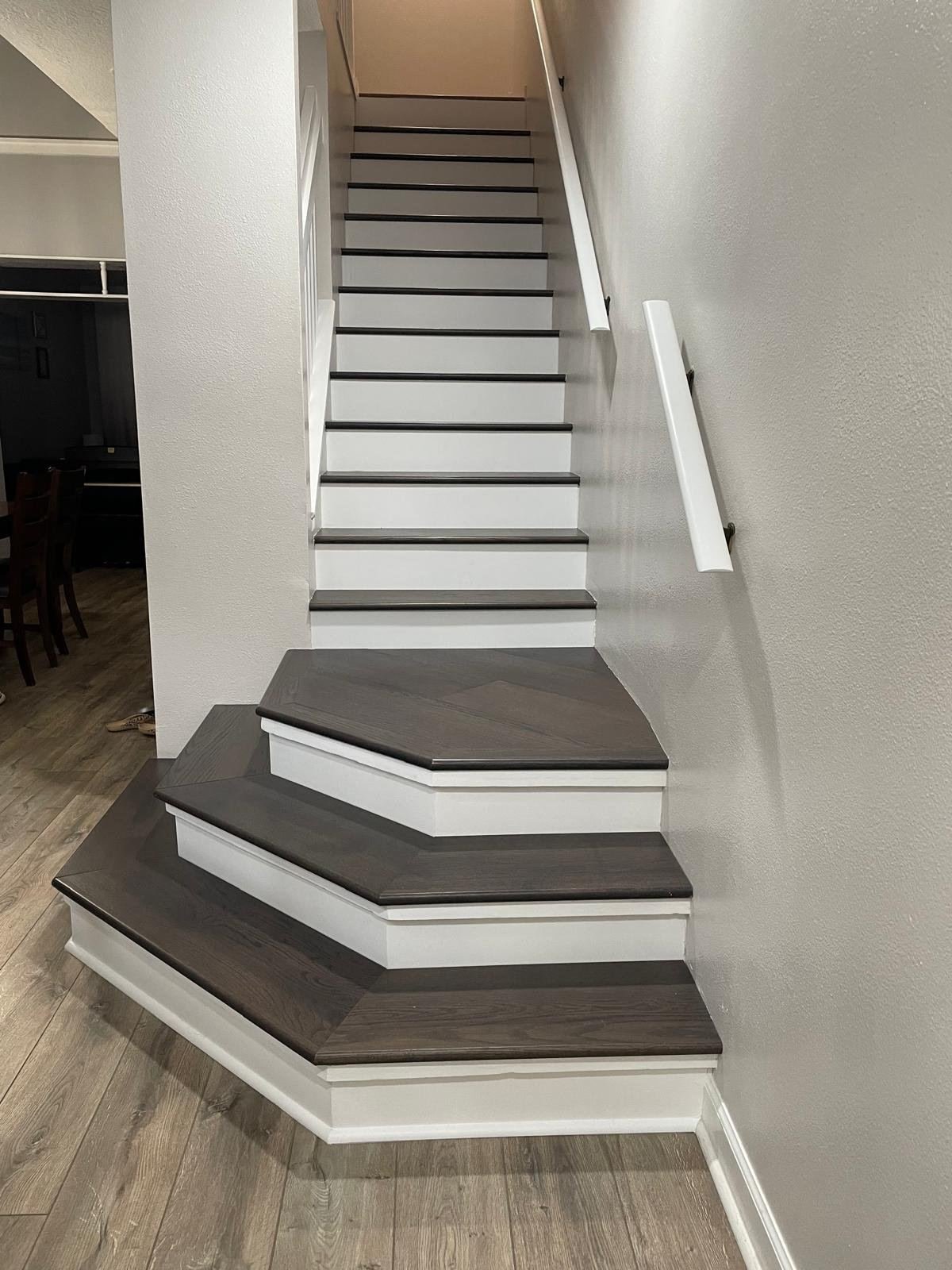 Refinished staircase treads and handrail